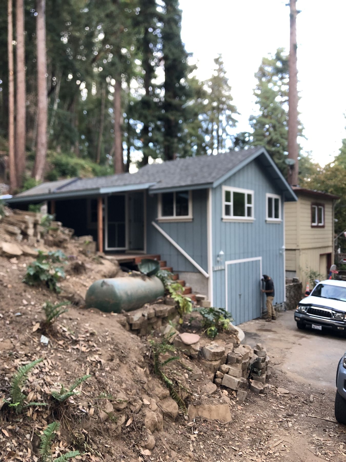 Rebuilt hillside home front view